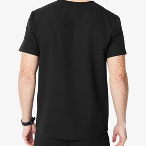 Selling new man scrub top figs